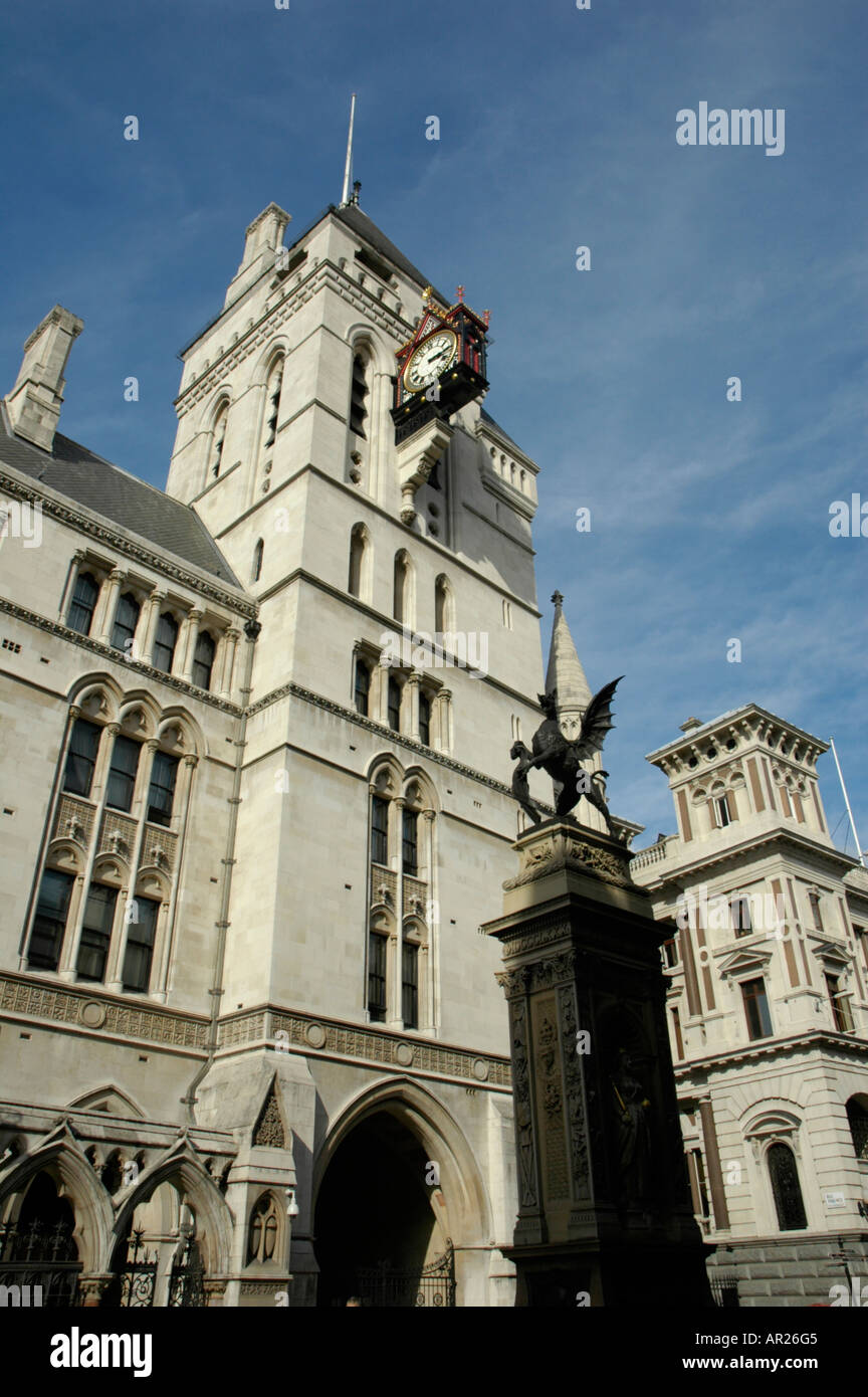 The Royal Courts of Justice and statue of dragon in The Strand London England Stock Photo Alamy