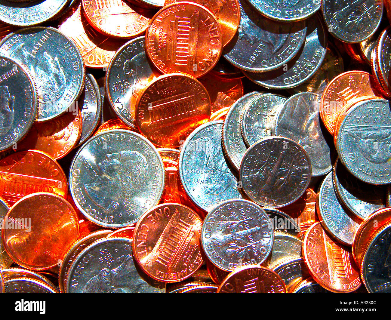 Piled us coins hi-res stock photography and images - Alamy