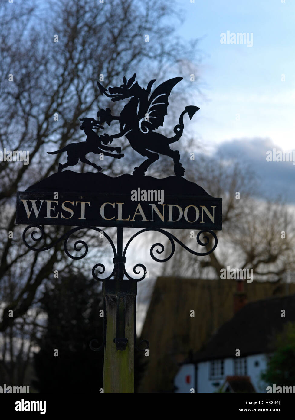 Village Sign West Clandon Surrey Dragon and Dog Stock Photo Alamy
