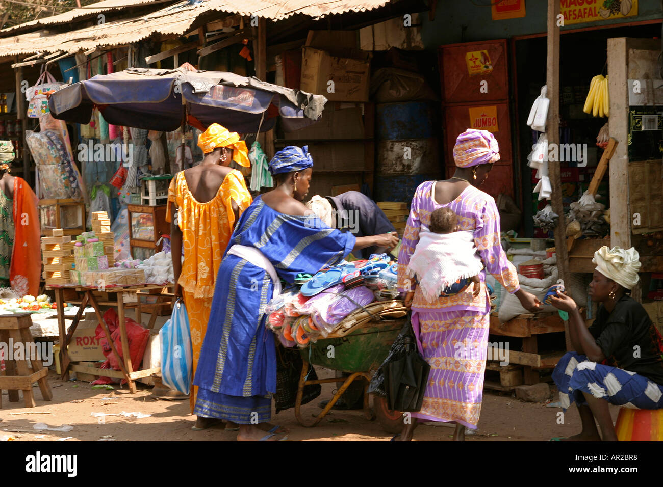 The Gambia Serekunda market colourfully dressed women Stock Photo Alamy