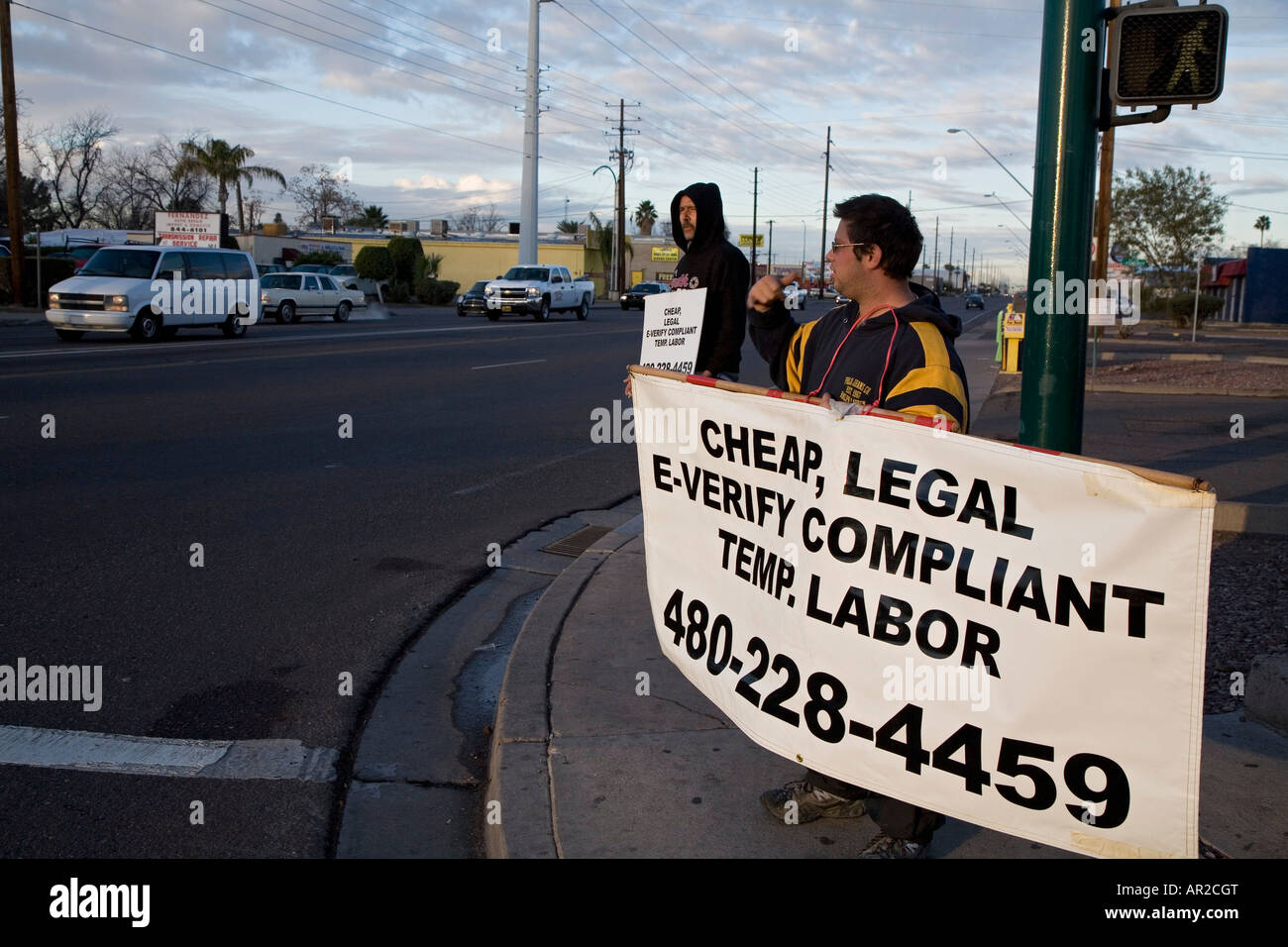 Temporary labor employer advertises that he provides cheap, legal workers Stock Photo