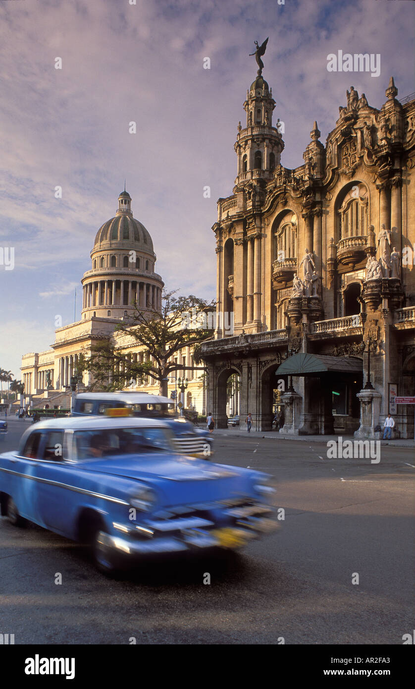 Old cars passing the Gran Teatro Capitolio Habana Vieja Havana Cuba Stock Photo
