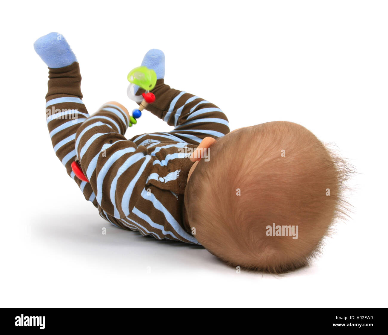 baby with comforter lying on its back Stock Photo Alamy