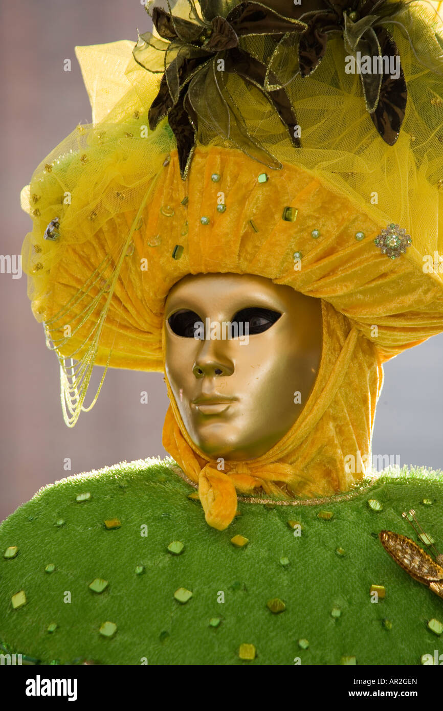 Reveller in mask and costume at the Venice carnival, in St Mark's