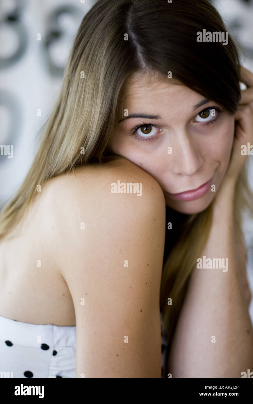 young woman looking naiv Stock Photo