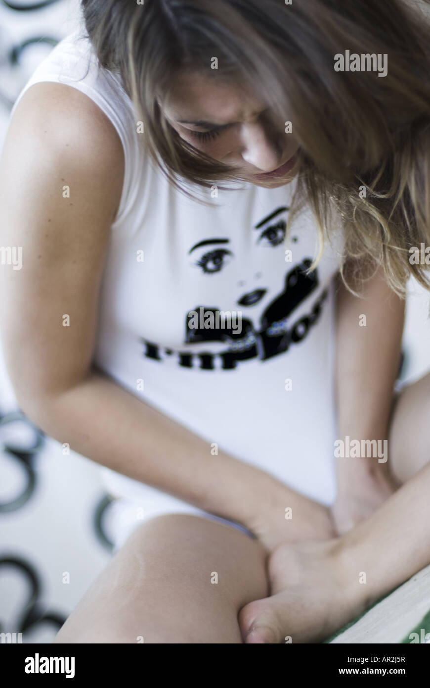 Hopeless person sitting on floor hi-res stock photography and images ...