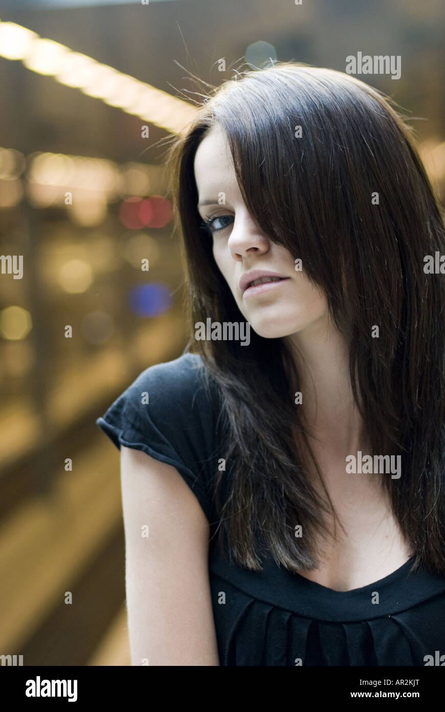 young woman looking arrogant towards the camera Stock Photo