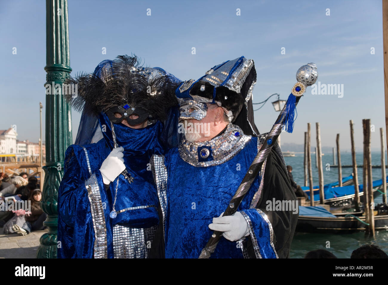 Revellers in mask and costume at the Venice carnival with the St mark's ...