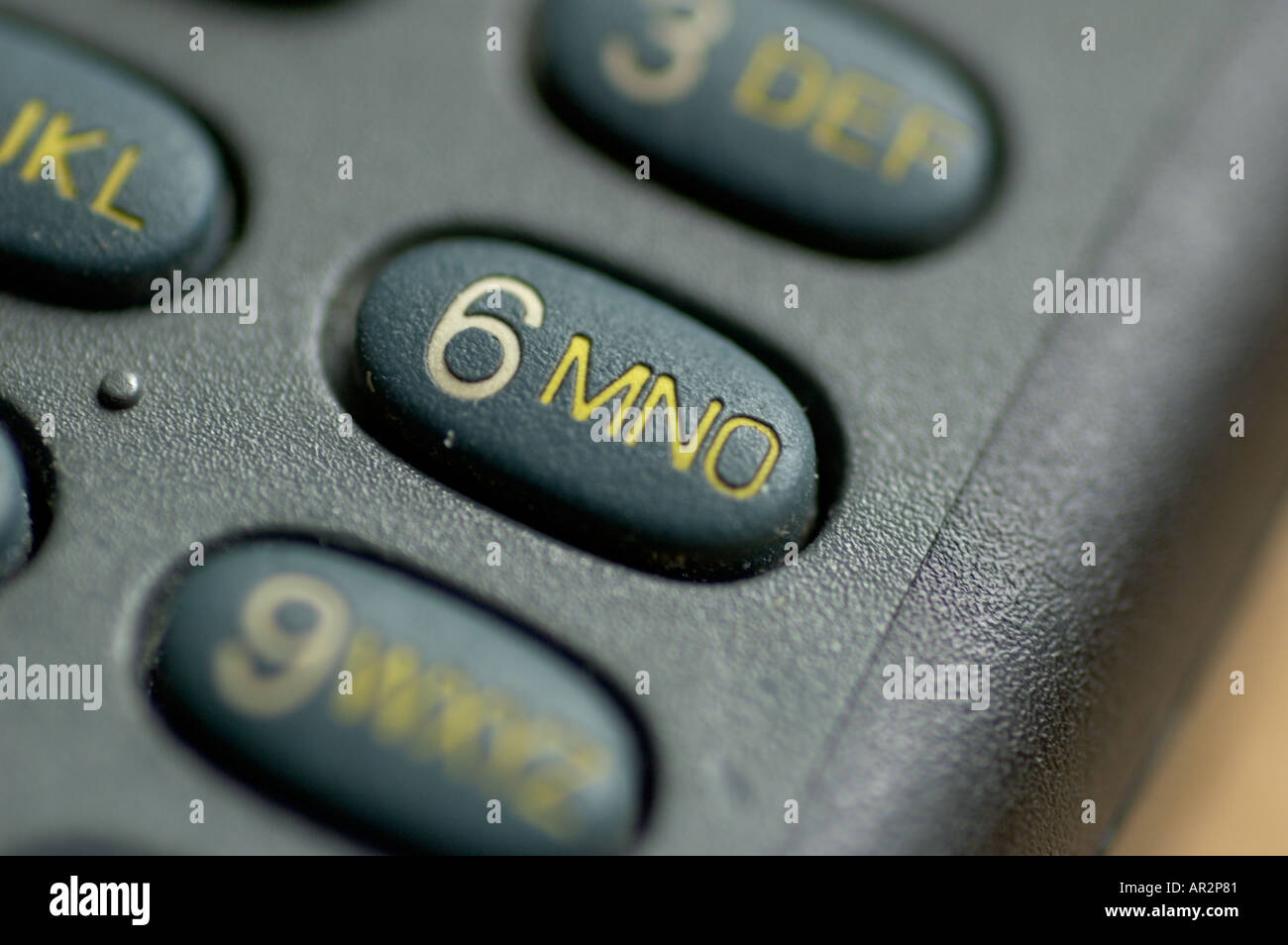 buttons with letters and numbers on a cellular phone. Stock Photo
