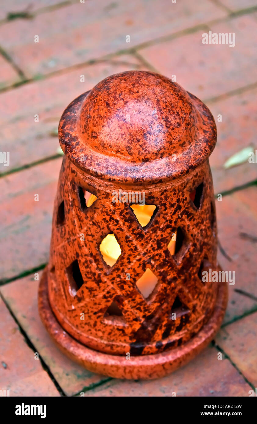 Clay lamp with candle Stock Photo Alamy