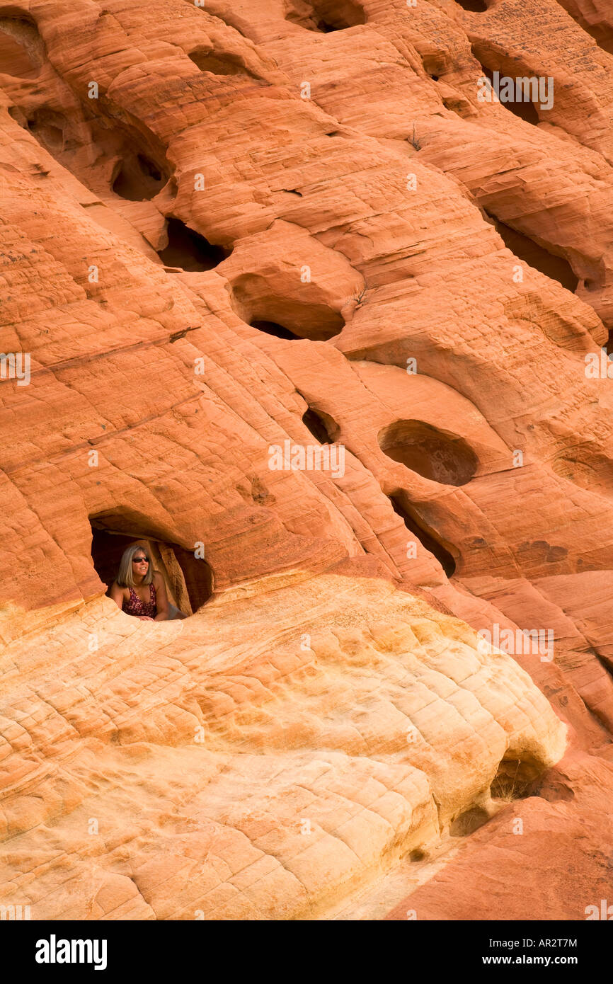 A visitor in Fire Canyon Valley of Fire State Park Nevada model ...