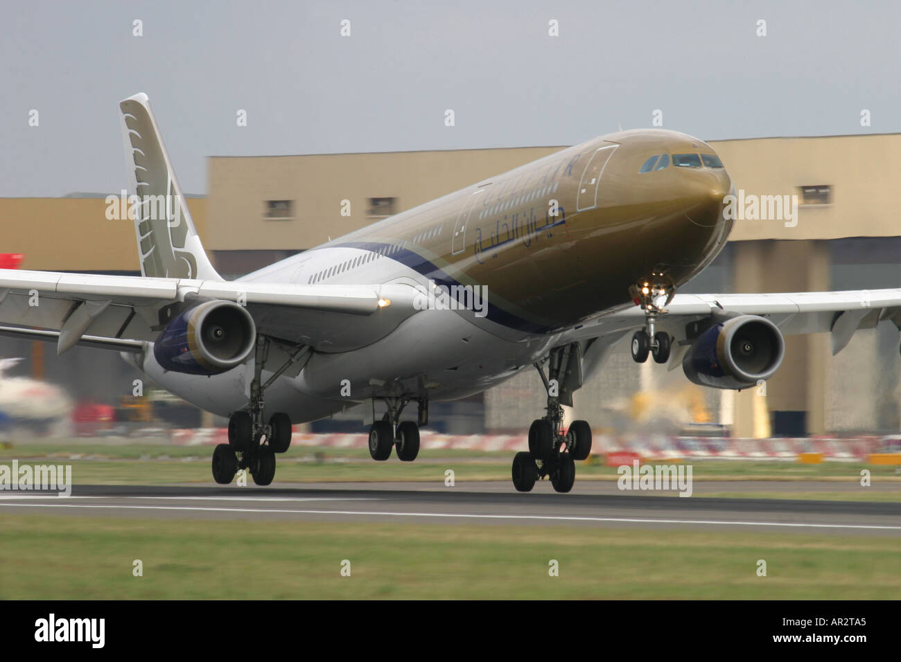 Gulf Air Airbus A340 313X landing at London Heathrow Airport UK Stock Photo