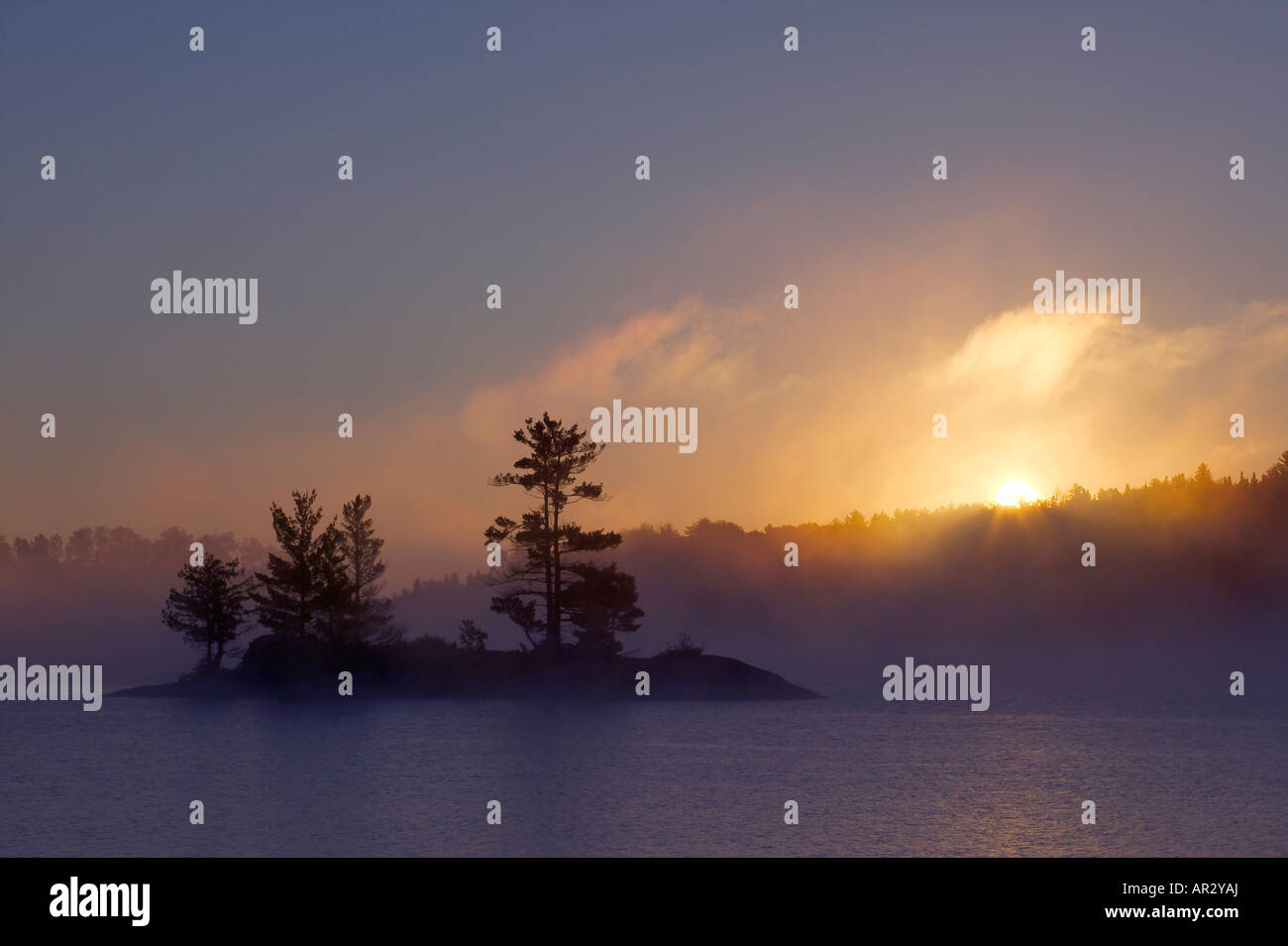 island in Namakan Lake at sunrise, Voyageurs National Park, Minnesota USA Stock Photo