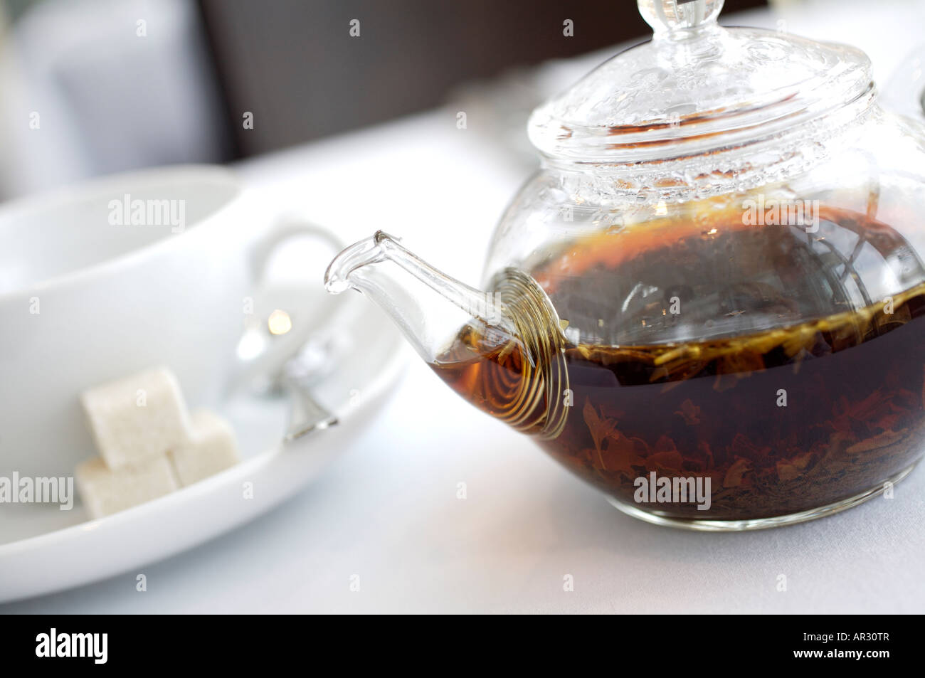 Glass pot of loose tea Stock Photo Alamy