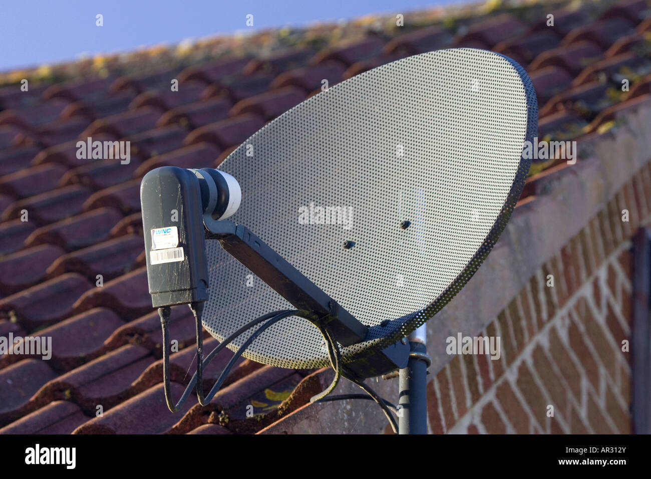 Sky Digital satellite dish on a roof Stock Photo