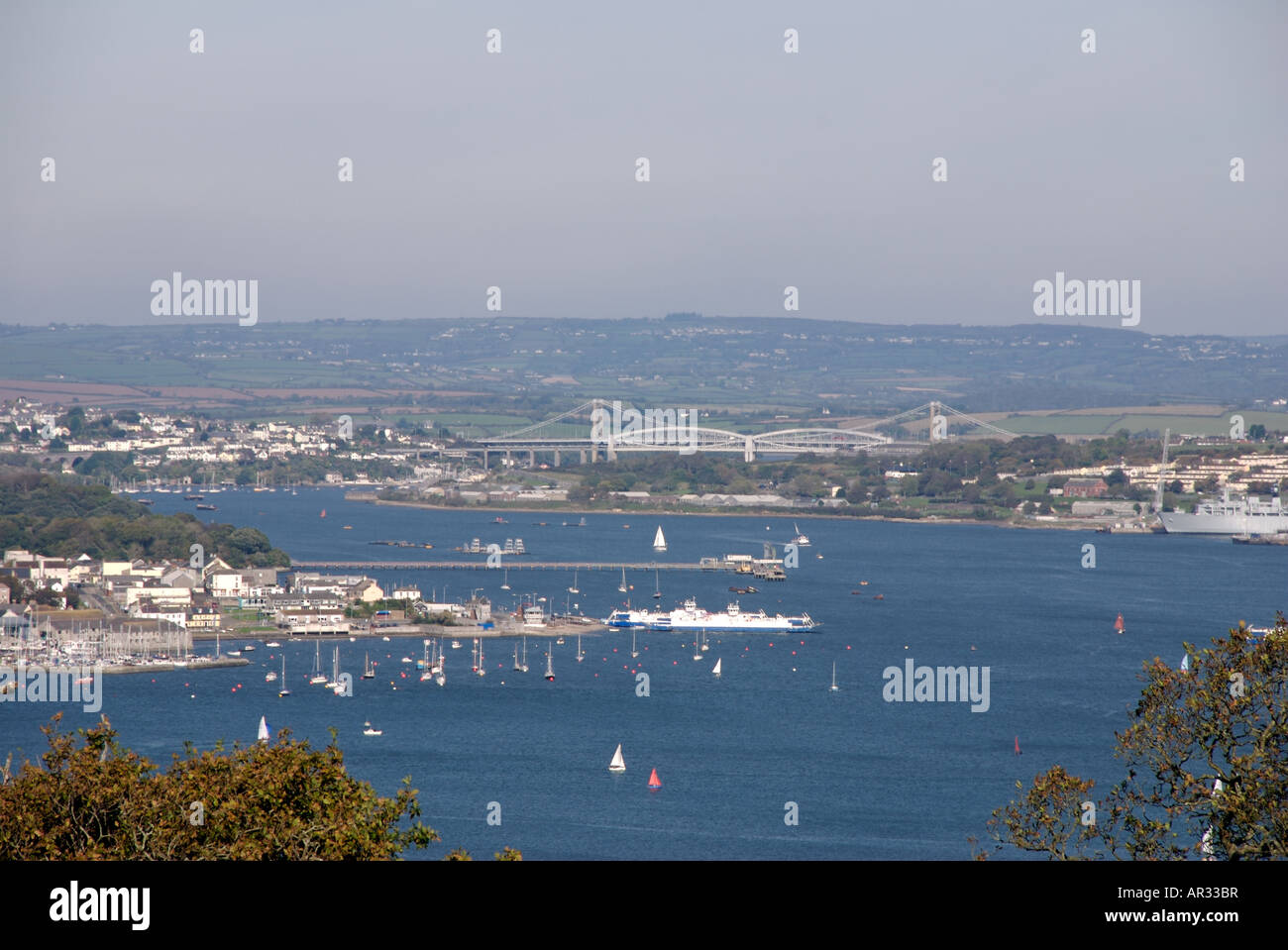View of the Tamar river valley with the Torpoint ferry and Isambard Kingdom Brunel's famous bridge, Plymouth, Devon, UK Stock Photo