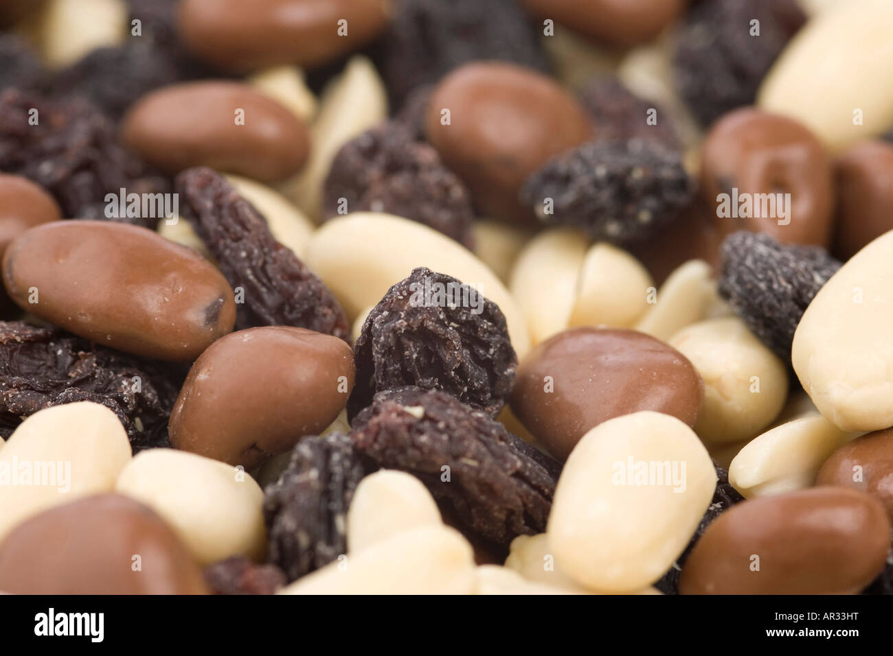 mixed peanuts, raisins and chocolate Stock Photo Alamy
