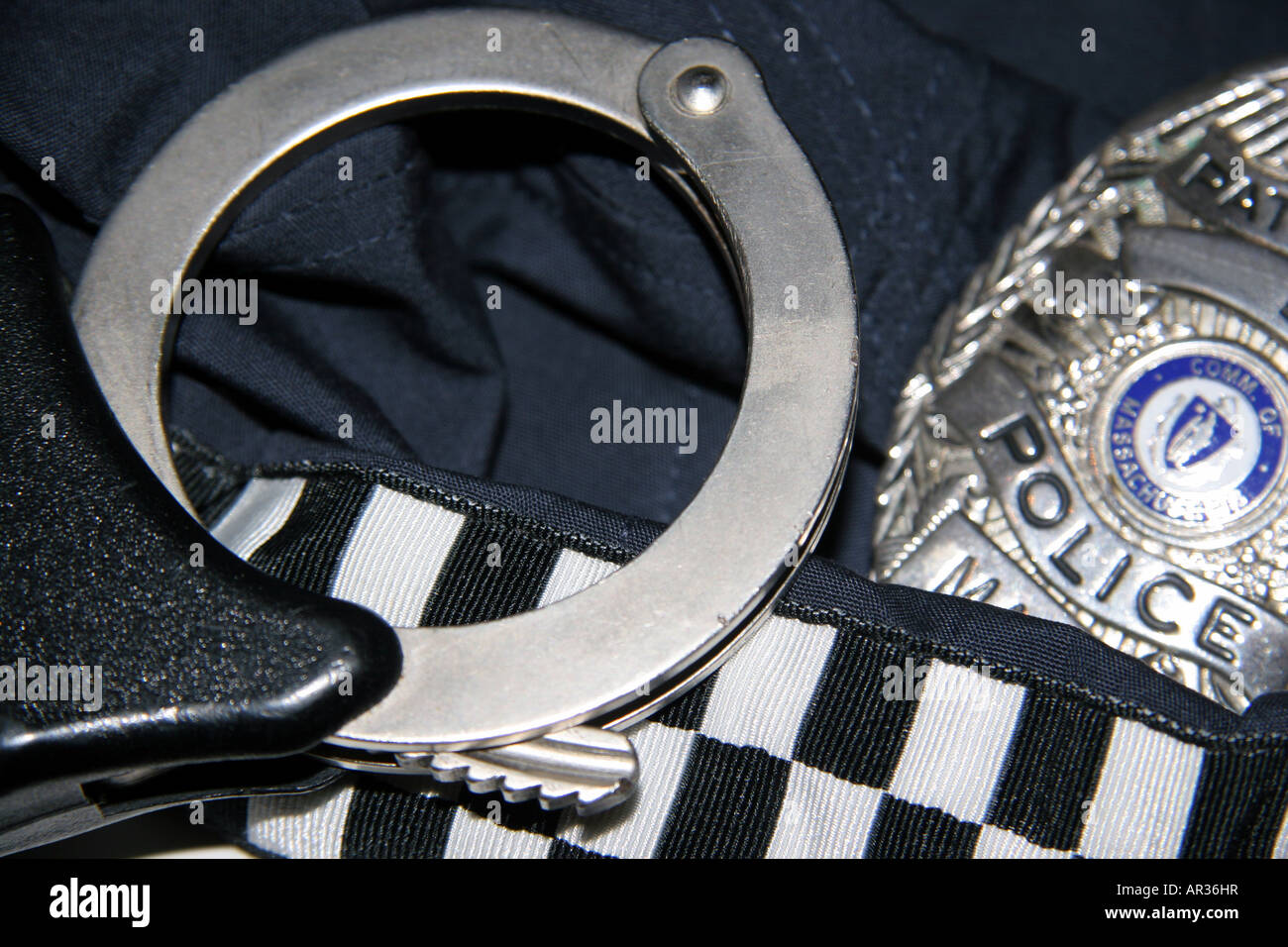 Police badge and handcuffs Stock Photo Alamy