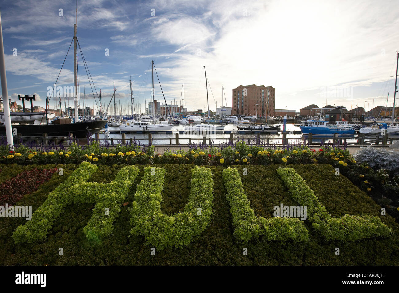 Flower bed in the shape of Hull Yachts and boats Hull Marina Kingston upon Hull East Yorkshire England UK Stock Photo