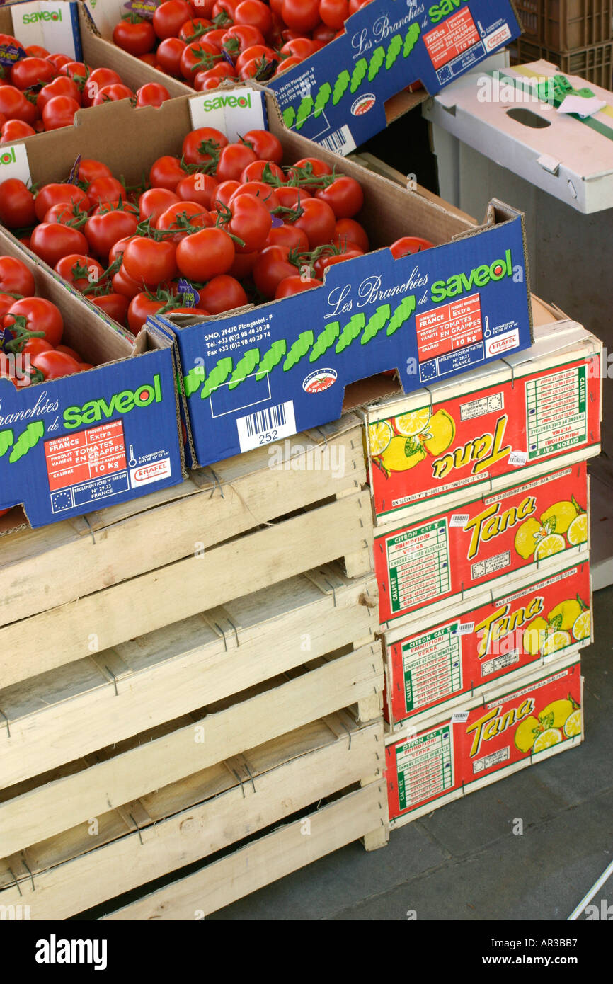 Boxes of red tomatoes stacked at market stall Stock Photo - Alamy