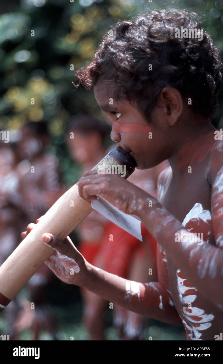 Australian aboriginal boy playing didgeridoo Stock Photo Alamy