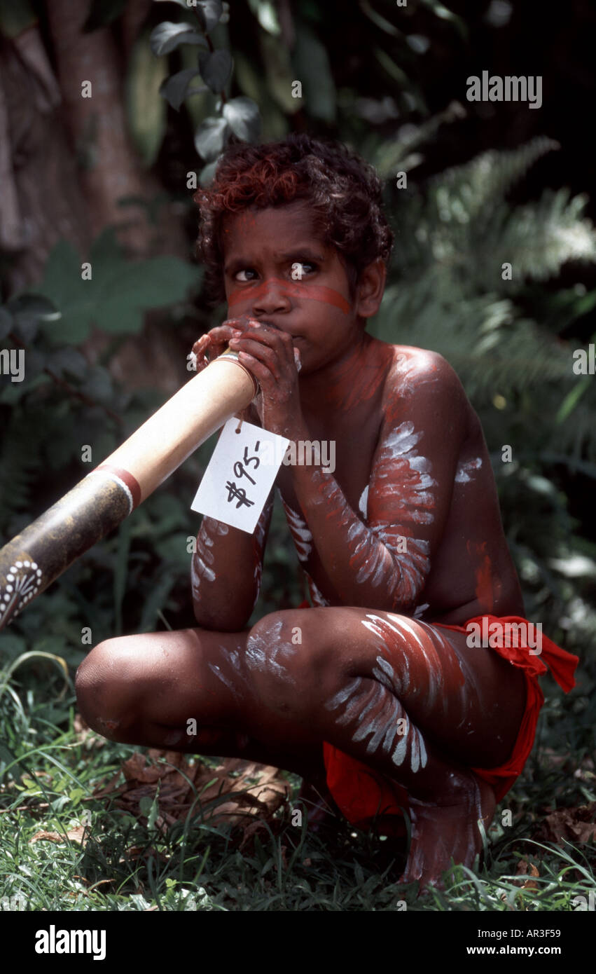 Australian aboriginal boy playing didgeridoo Stock Photo Alamy
