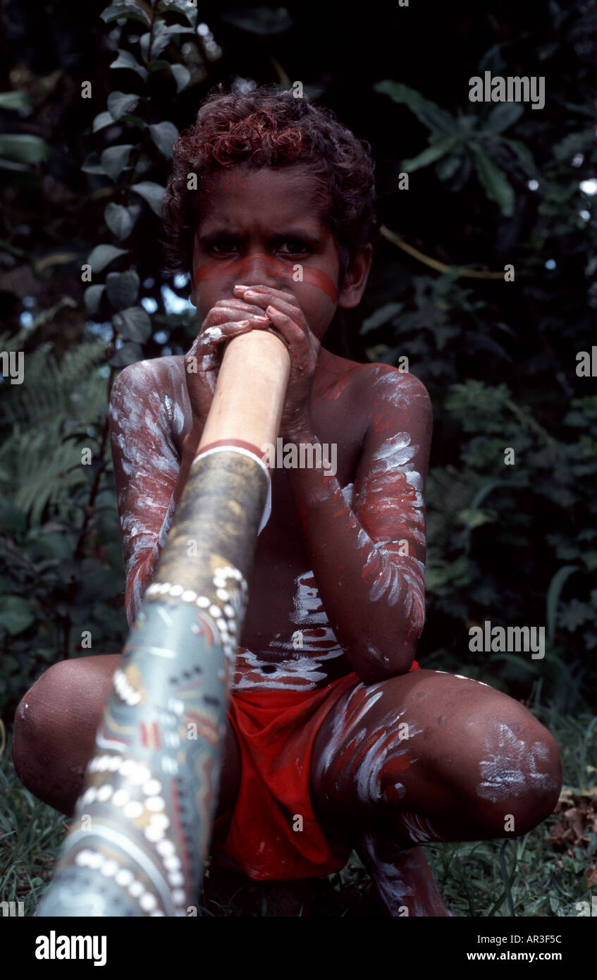 Australian aboriginal boy playing didgeridoo Stock Photo Alamy