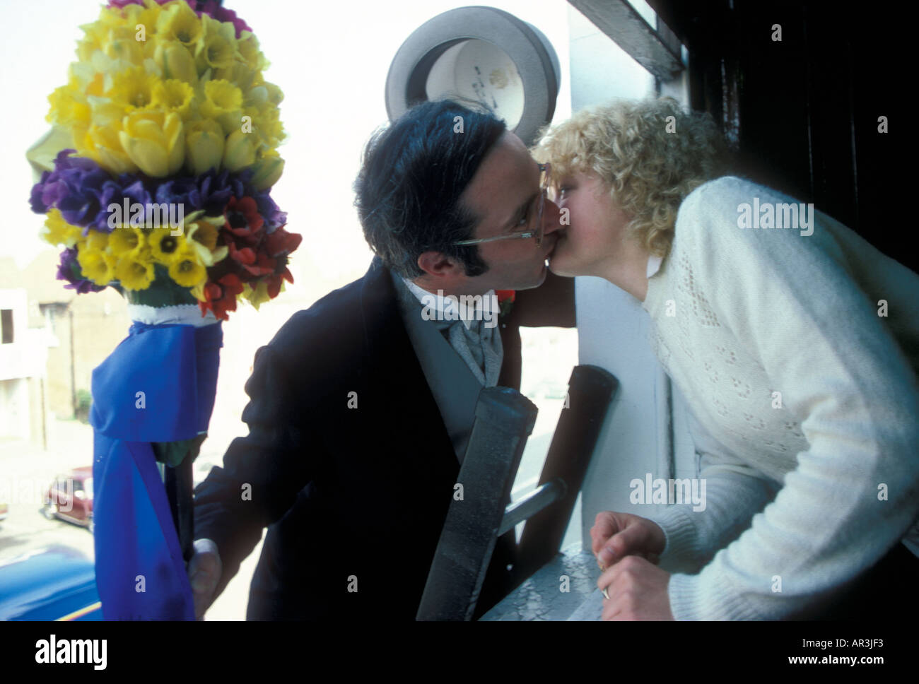 A Tuttiman claiming a kiss during the Hungerford Hocktide custom. UK Stock Photo