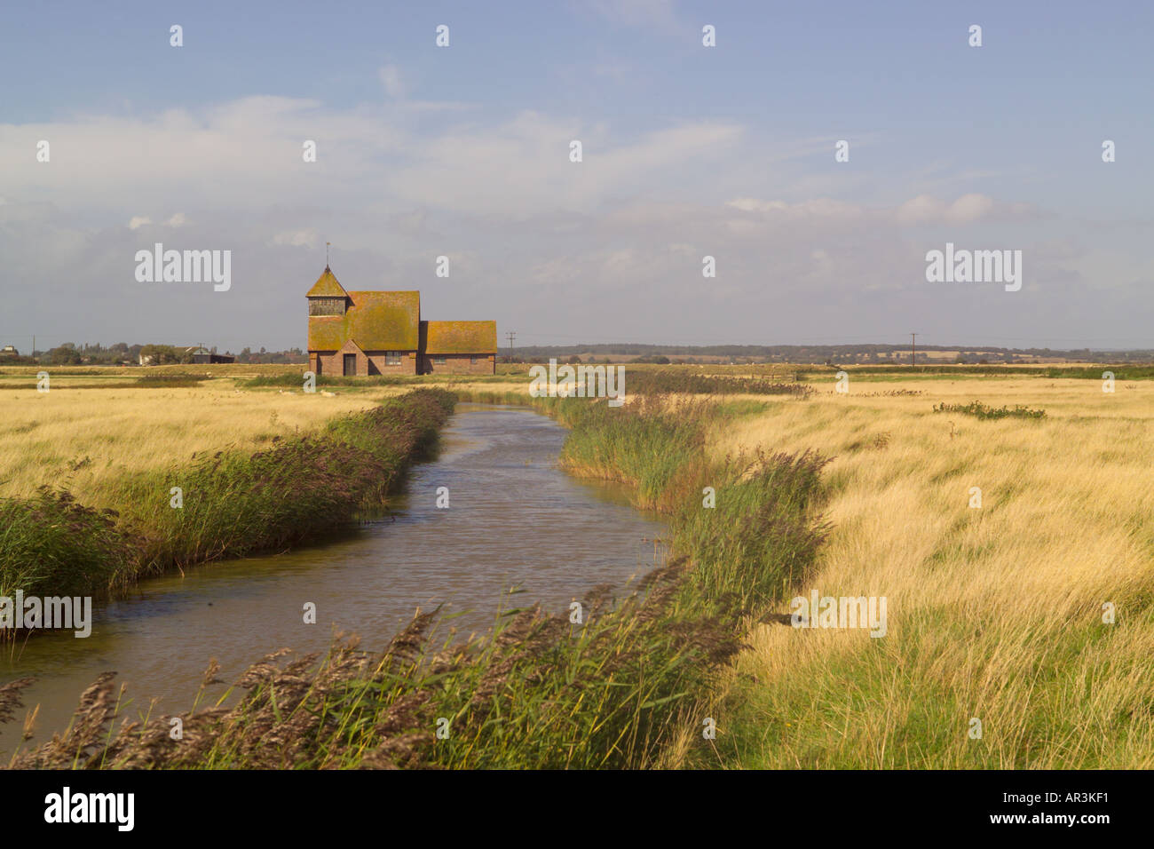 Romney Marsh landscape and Fairfield Churcho of St Thomas Becket near the village of Brookland, Kent Stock Photo