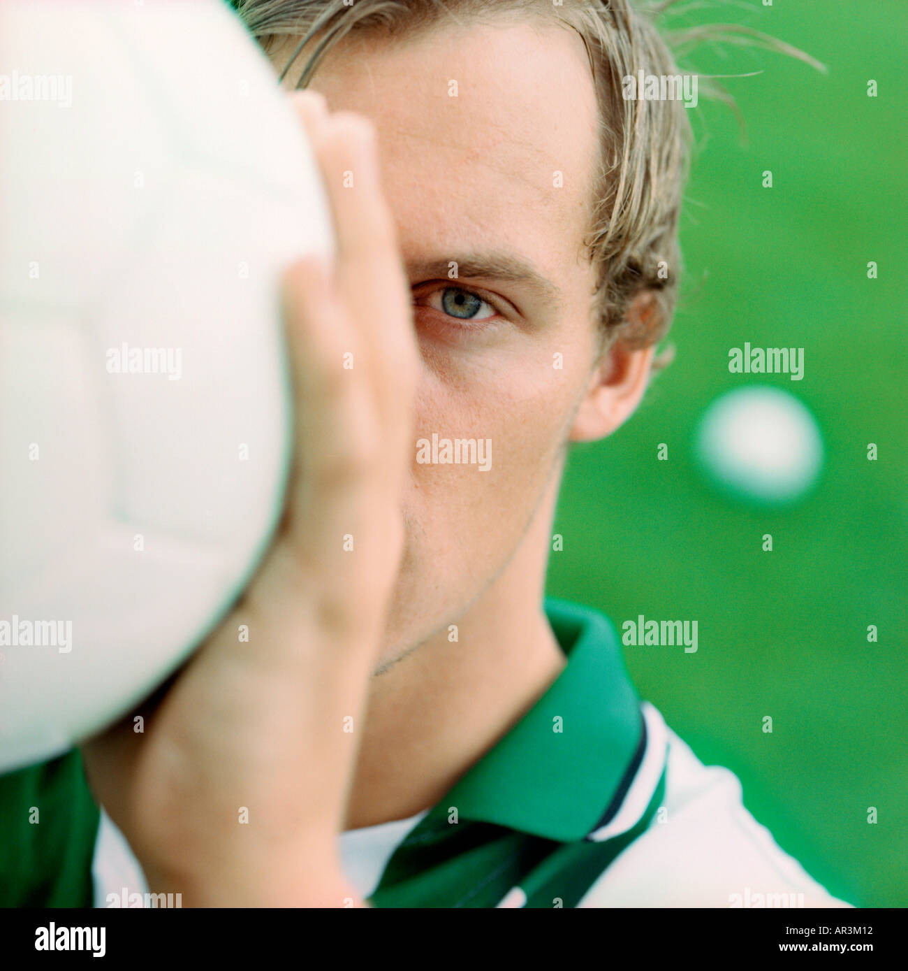 portrait of soccer player on lawn playing with his balls Stock Photo