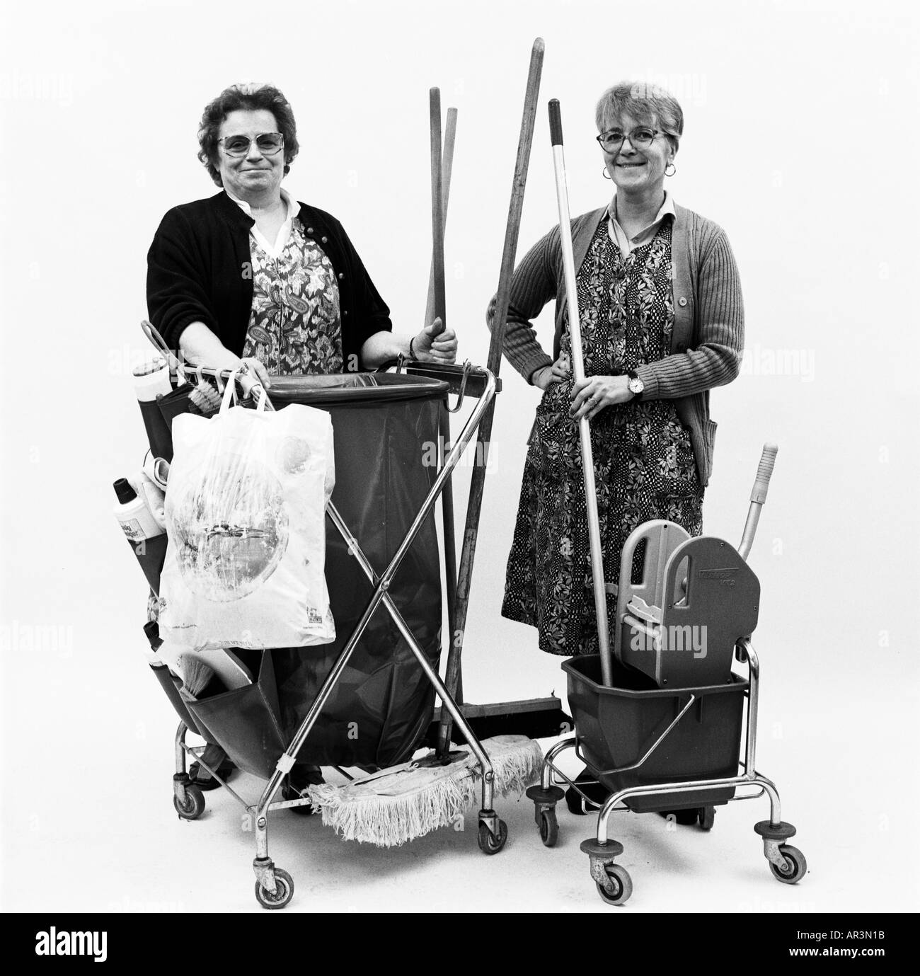 two charwomen with equipment Stock Photo