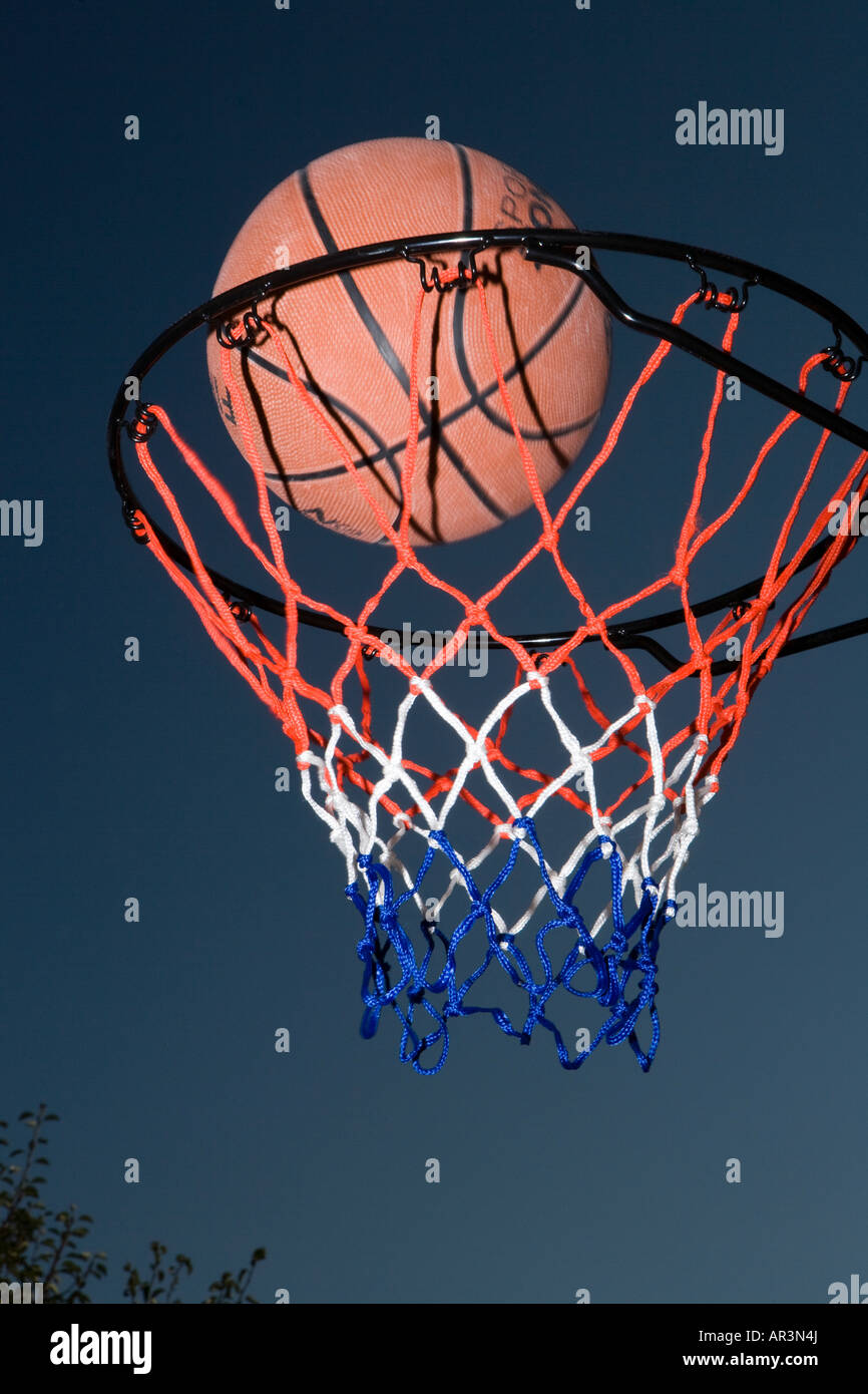basketball going through the hoop Stock Photo Alamy