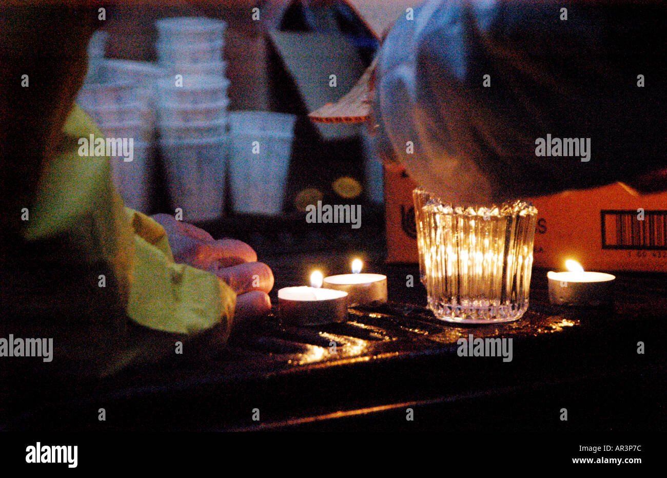 Preparing for a candlelight vigil Stock Photo