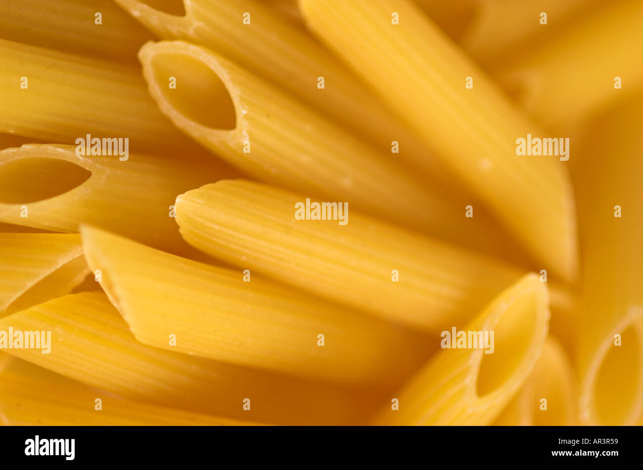 Download Dry Yellow Pasta Penne Rigate Stock Photo Alamy PSD Mockup Templates