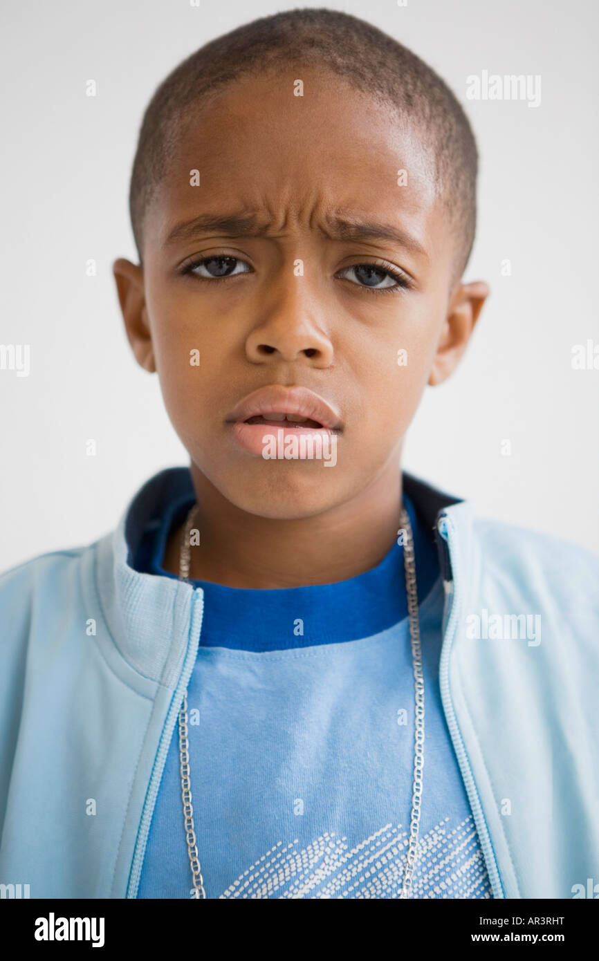 African boy with furrowed brow Stock Photo - Alamy