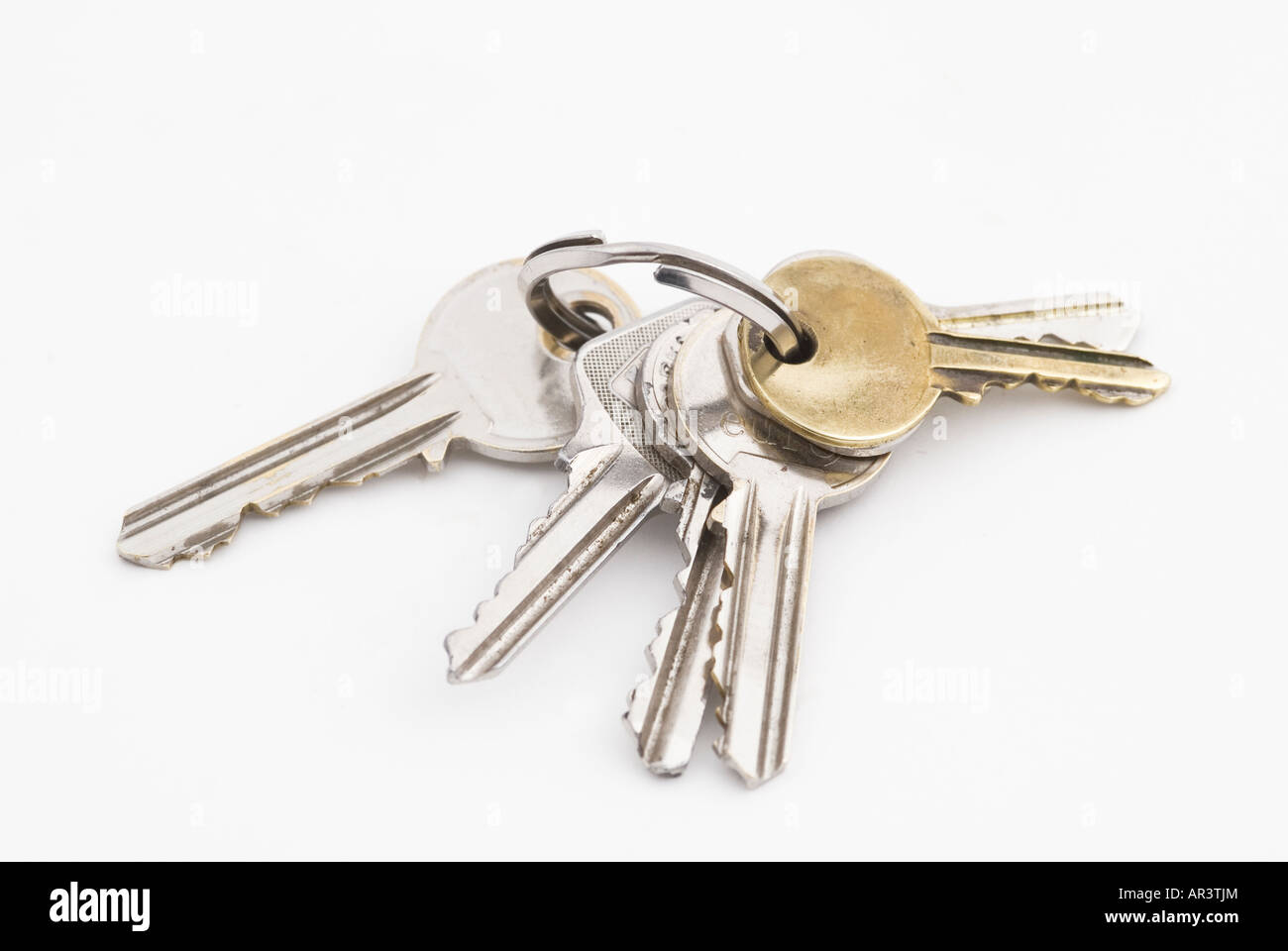 Bunch of house keys on white background Stock Photo