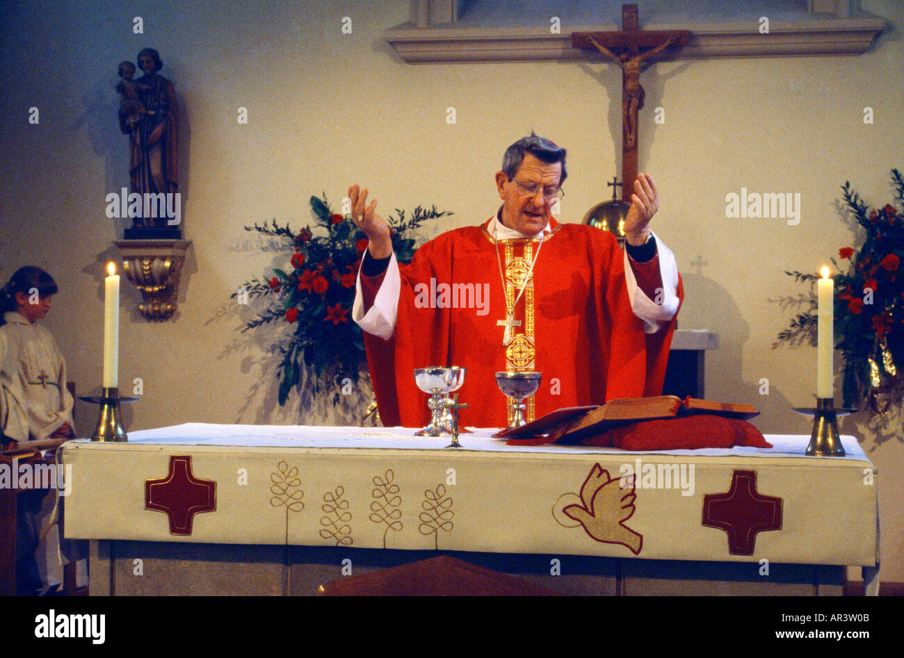 Pentecost Communion Bishop With Outstretched Arms St Anne's Church Kingston Stock Photo