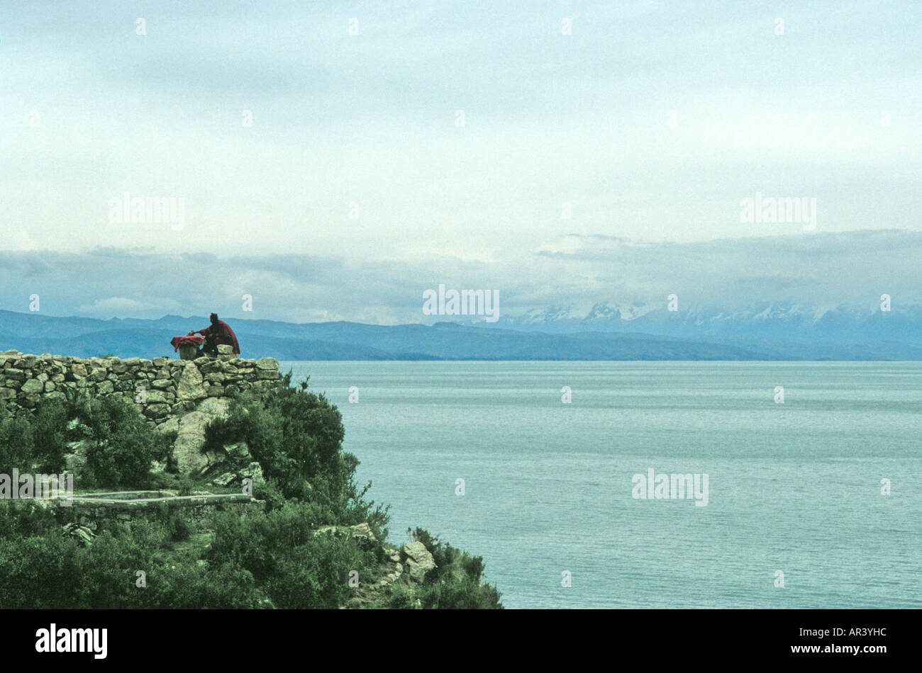 Lone Priest on Sun Island, Lake Titicaca, Bolivia Stock Photo