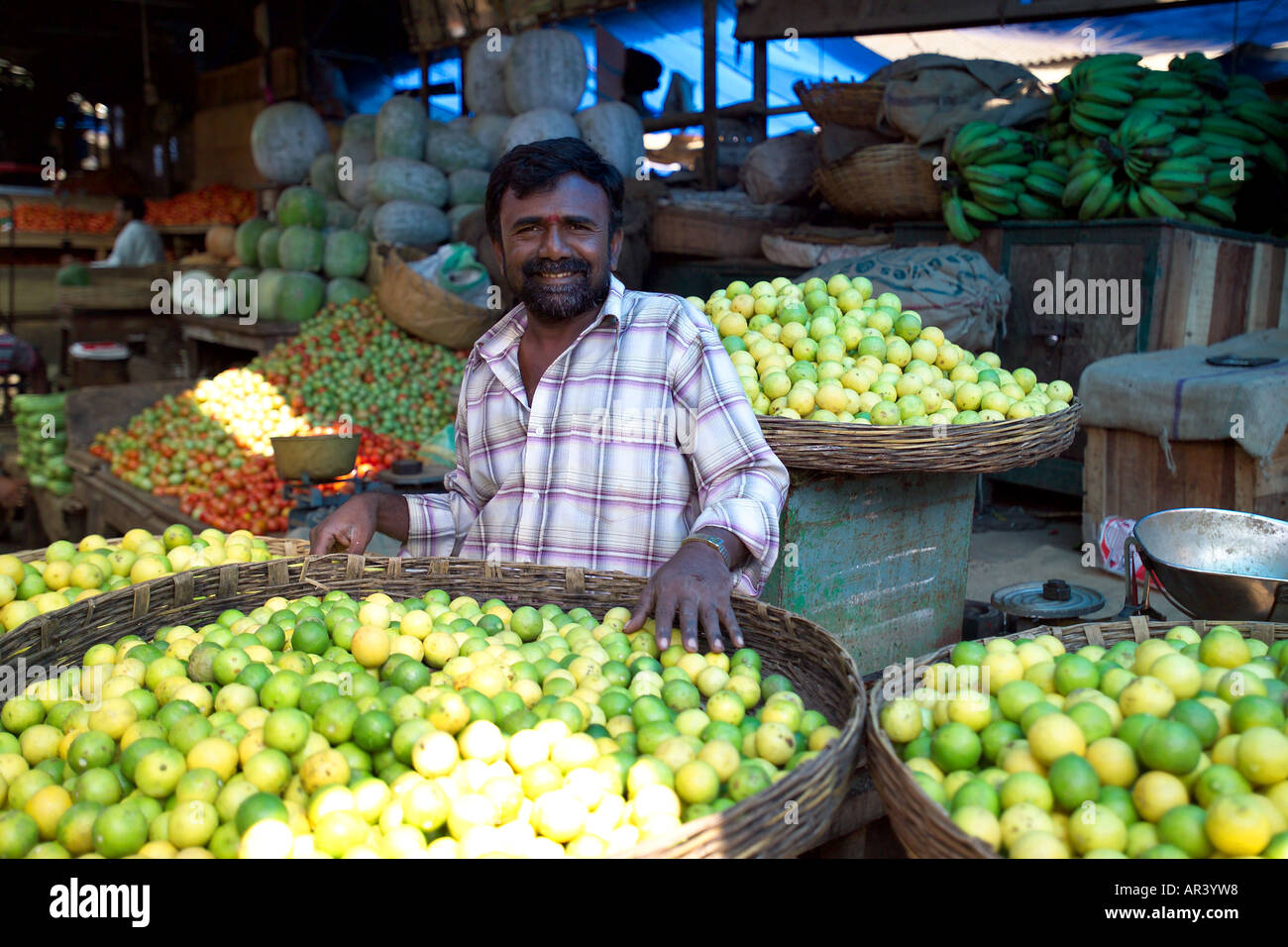 Smiling stall holder at Russell Market fruit and Vegetable Market