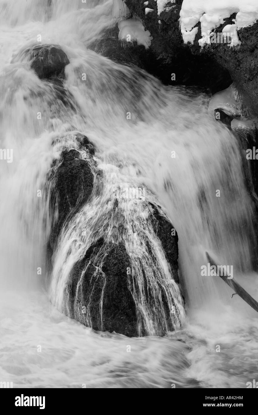 Yellowstone National Park Madison River waterfall rapids in winter snow and ice Stock Photo