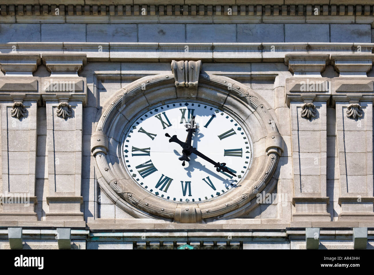 Clock atop the Napoleon III style architecture of Montreal City hall