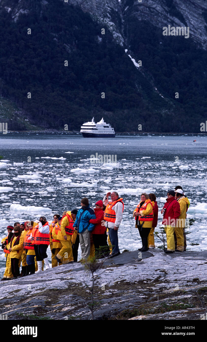 Passengers and MV Mare Australis in Chilean fjords south america near Pia Glacier Stock Photo