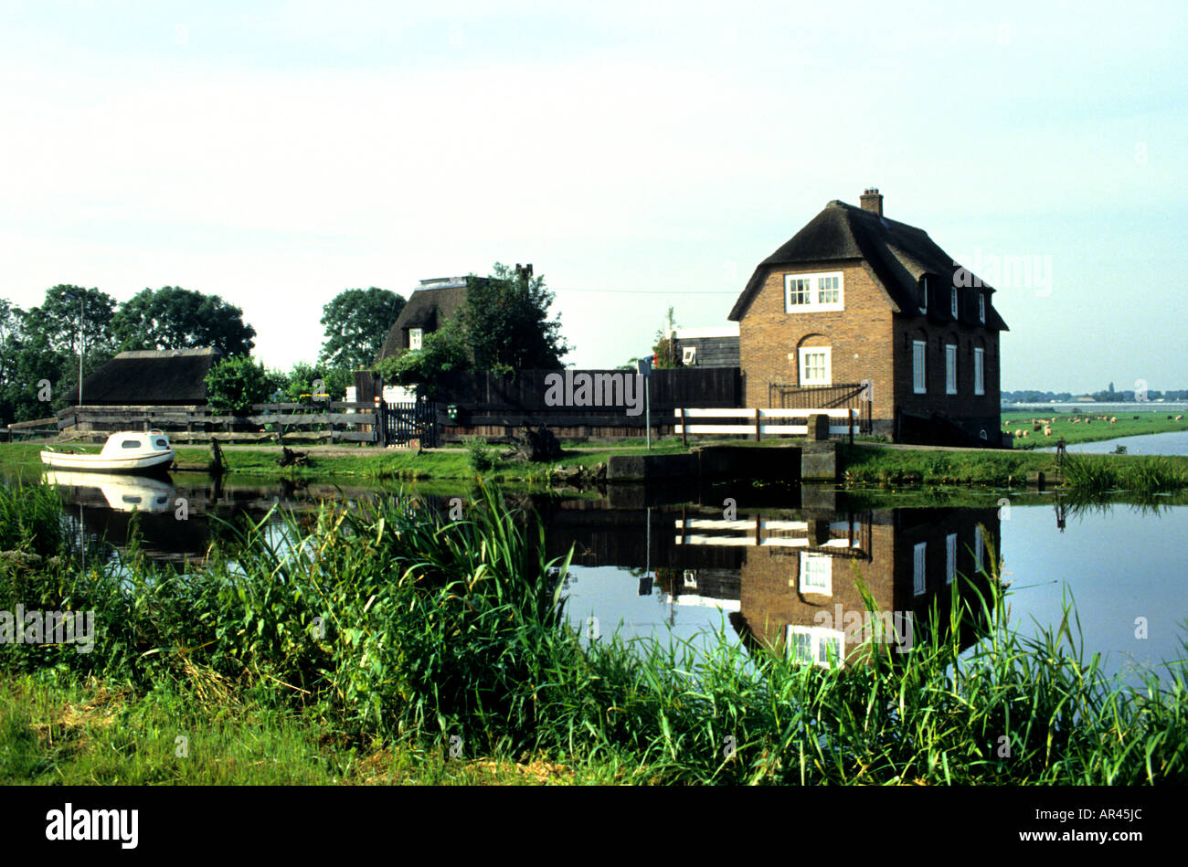 Netherlands near Delft South Holland  Zuid Holland Canal Dike House Stock Photo