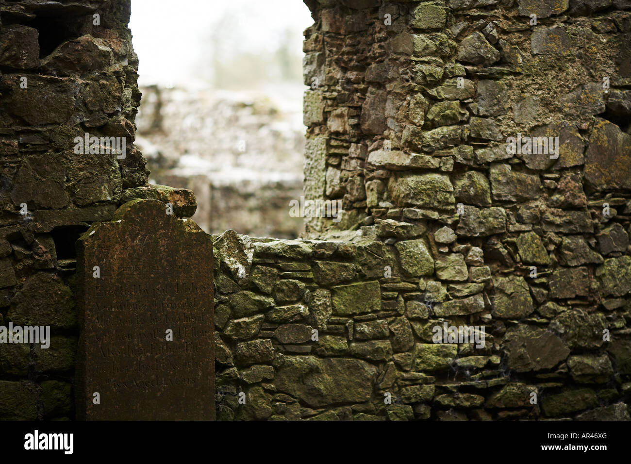 Stone Gravestone by Window in Cashel County Tipperary Republic of Ireland Europe Stock Photo