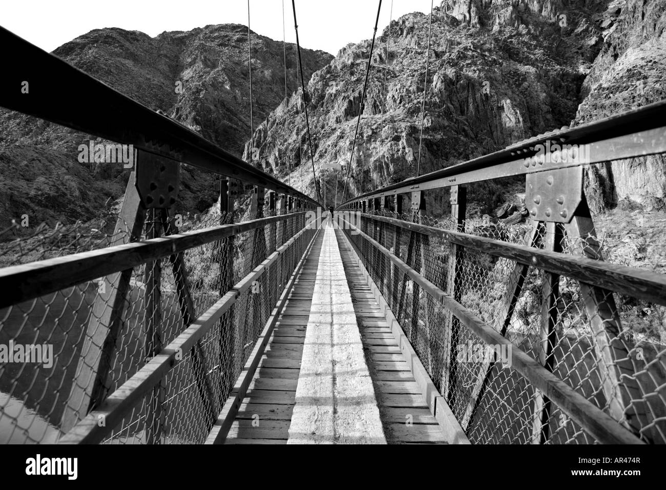 River hiking trail suspension bridges Black and White Stock Photos