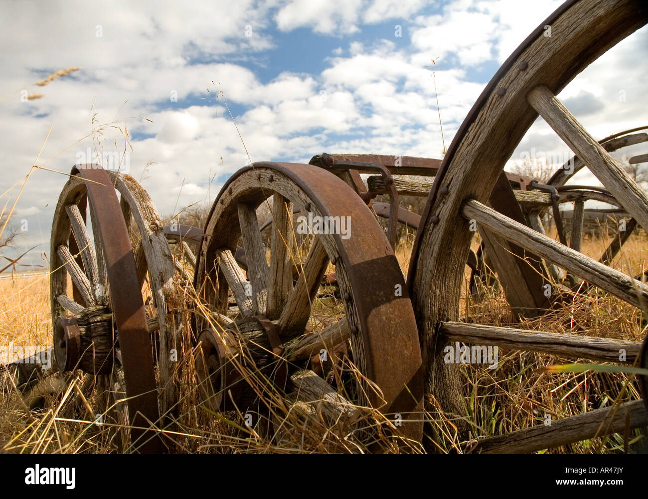 Old wagon wheels on a farm Stock Photo - Alamy
