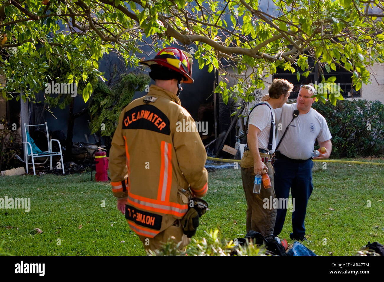 Firefighters at Apartment Fire Stock Photo Alamy