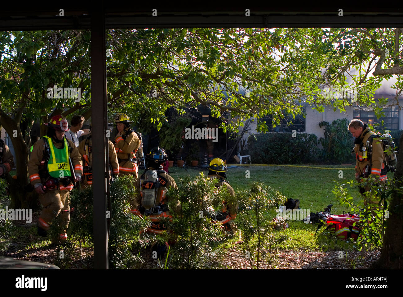 Firefighters at Apartment Fire Stock Photo Alamy