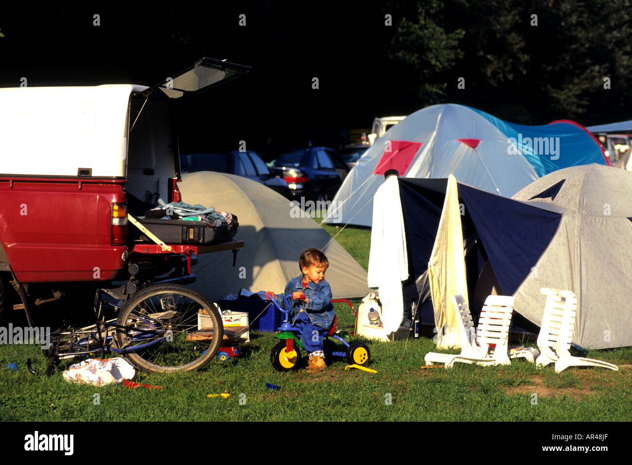 Campsite camp camping campground tent little boy Wales England Stock