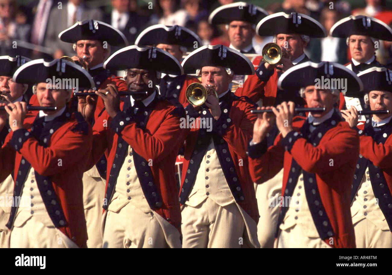 The President's Own drum and Bugle corps pass in review during a White